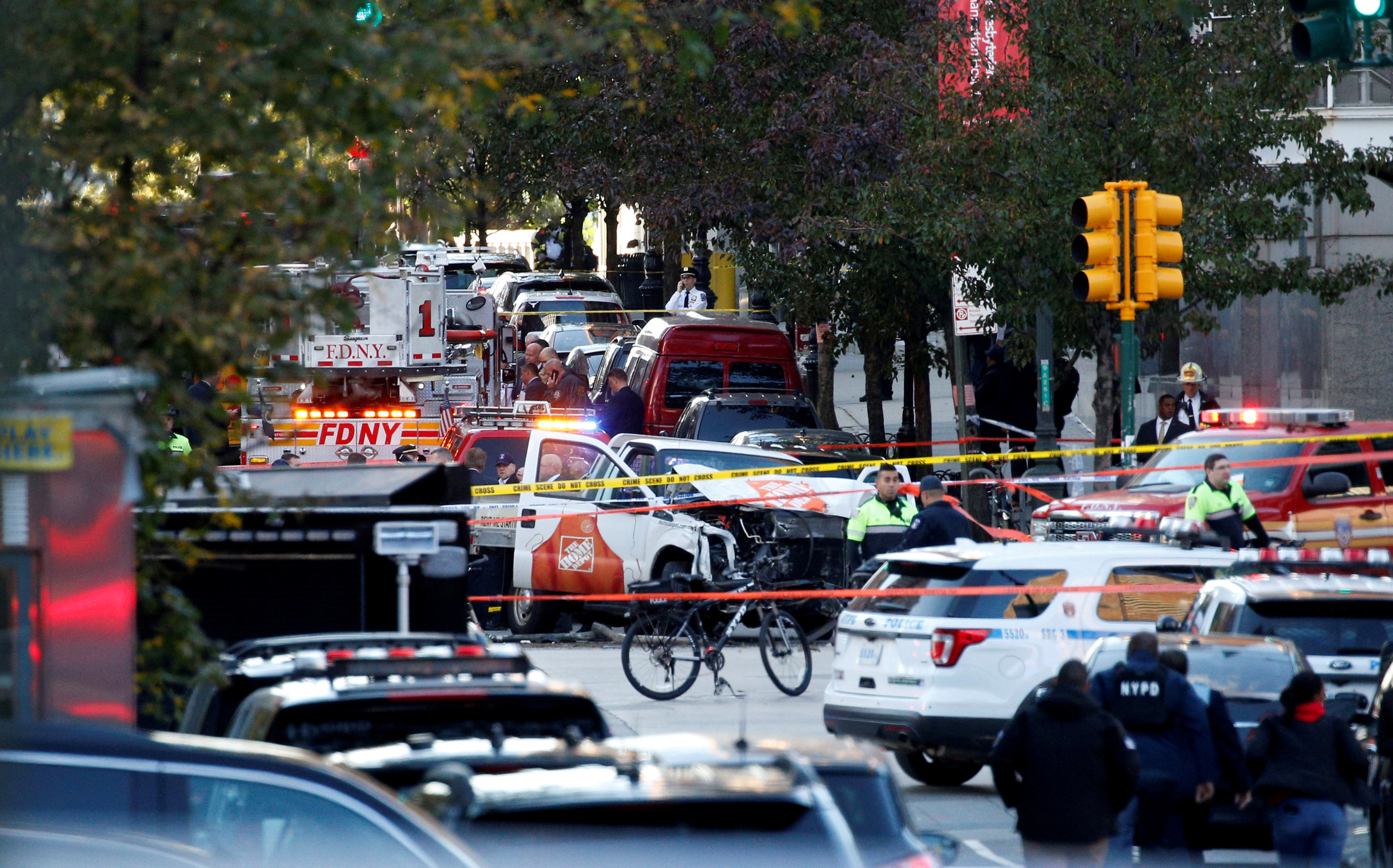 REFILE - ADDING INFORMATION   A Home Depot truck which struck down multiple people on a bike path, killing several and injuring numerous others, is seen as New York city first responders are at the crime scene in lower Manhattan in New York, NY, U.S., October 31, 2017.  REUTERS/Brendan McDermid     TPX IMAGES OF THE DAY