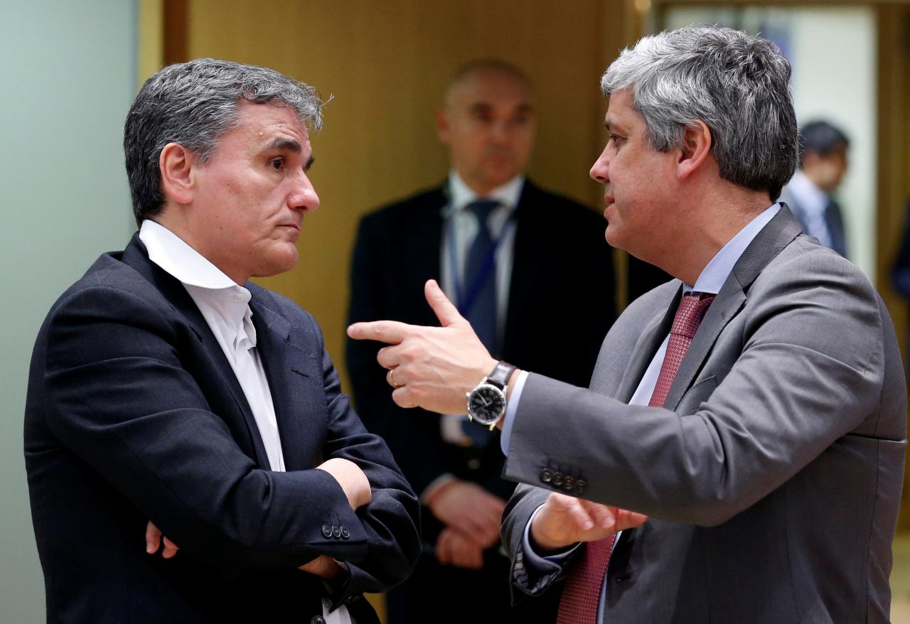Greek Finance Minister Tsakalotos and Eurogroup President Centeno attend a eurozone finance ministers meeting in Brussels
