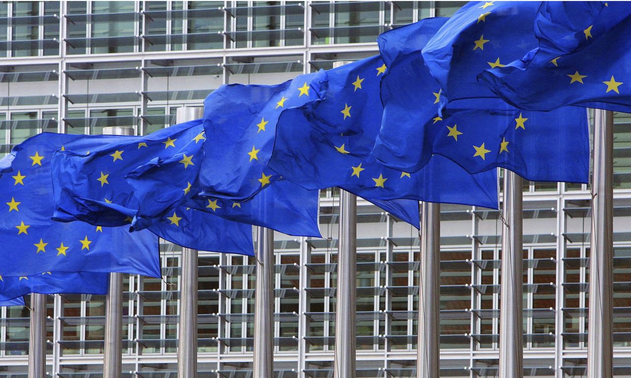 European Union flags outside the European Commission headquarters in Brussels